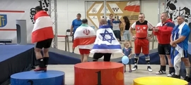 Iranian Weightlifter Faces Lifetime Ban for Snapshot with Israeli Athlete